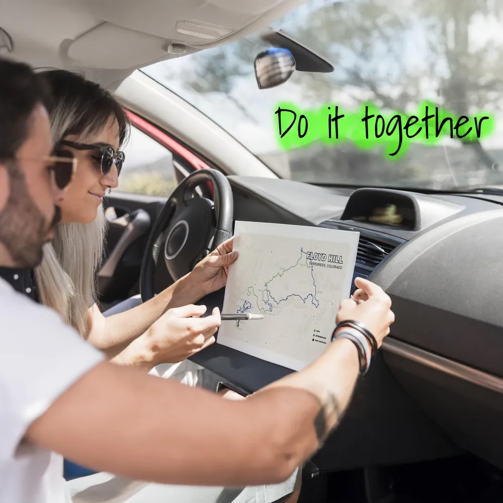 Floyd hill Evergreen_close-up-couple-car-looking-map