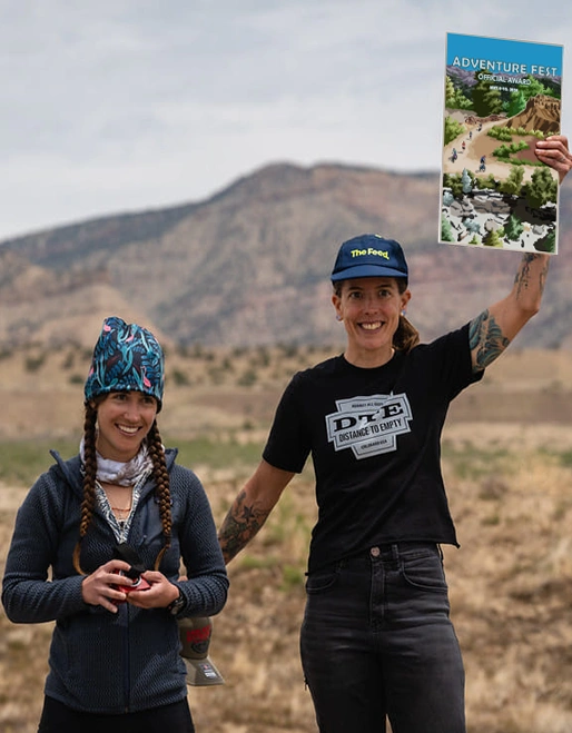 Adventure Fest_women holding poster
